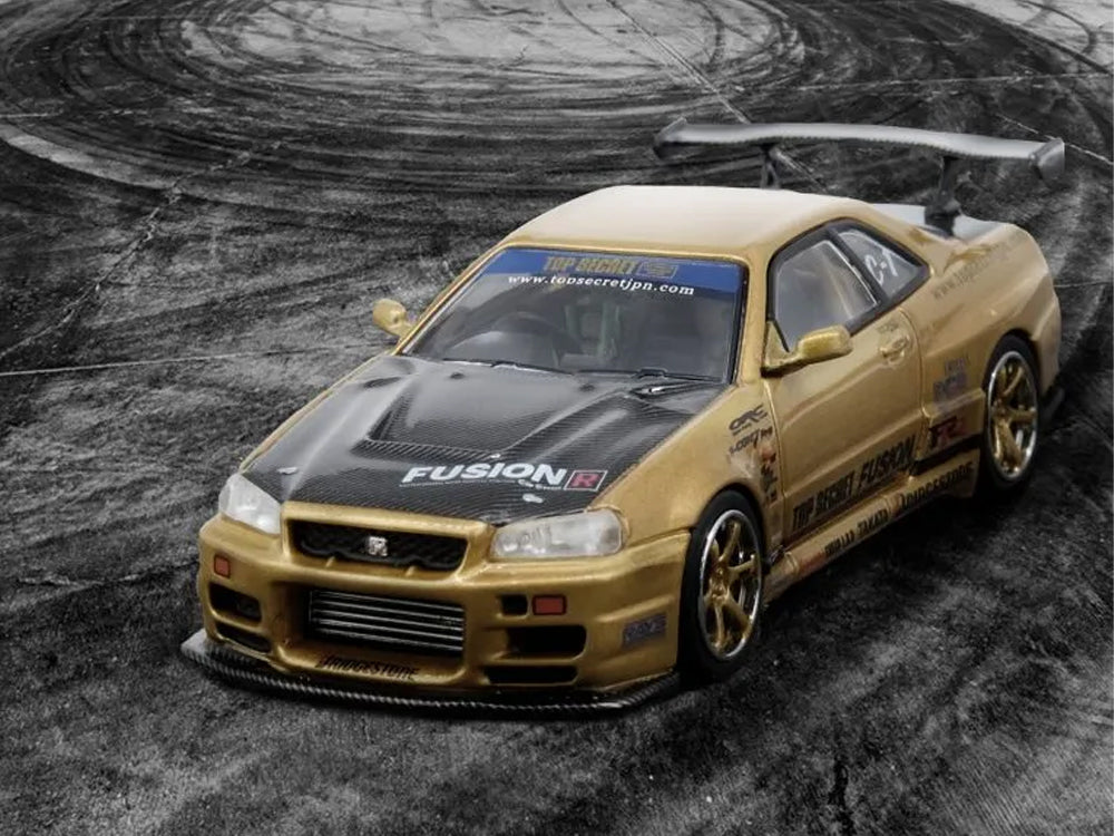 Inno64 Nissan Skyline GT-R R34 Top Secret Gold