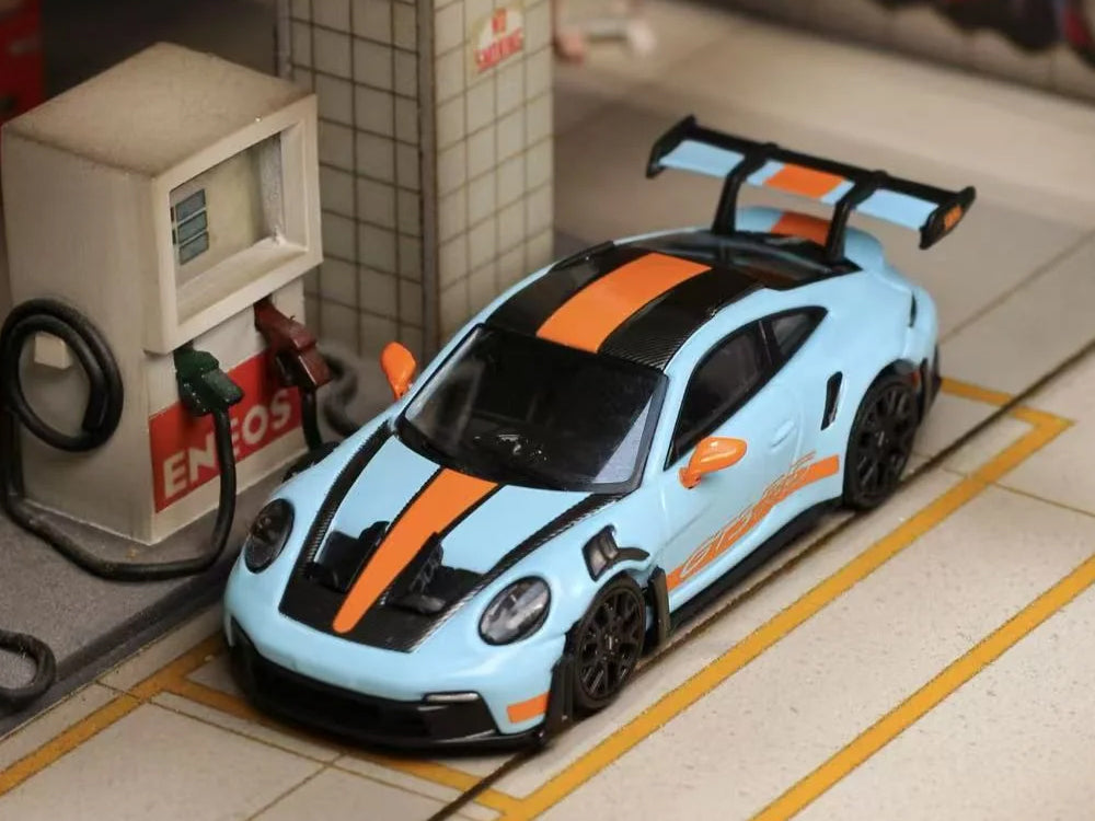 Street Weapon 1/64 Porsche 911-992 GT3 RS with Carbon Bonnet with Black Wheels Gulf Blue