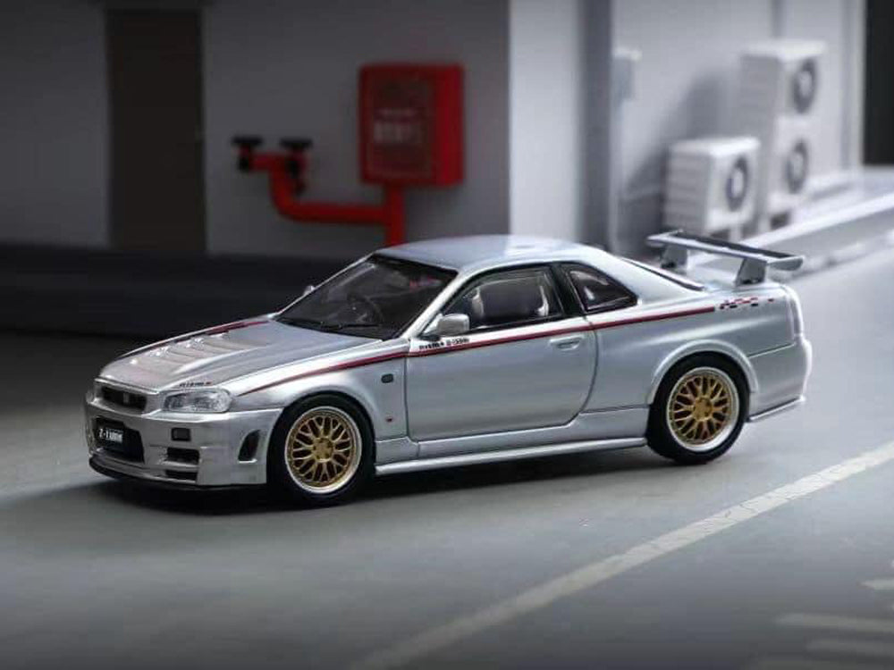 Stance Hunters 1/64 Nissan Skyline GT-R R34 Z Tune Nismo Livery with Gold BBS Wheels Silver - Diecast Toyz Australia